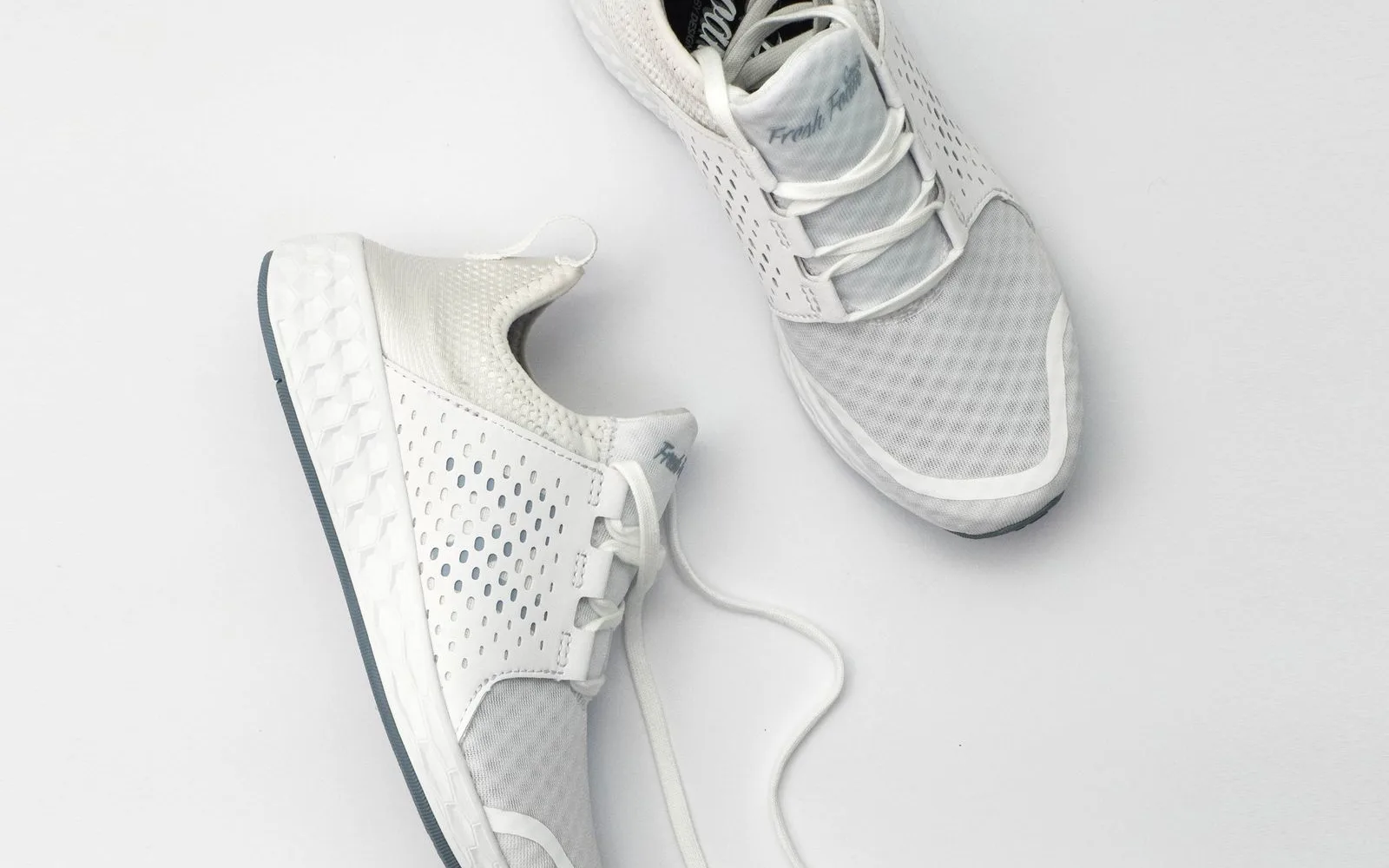 White casual sneakers on a white surface