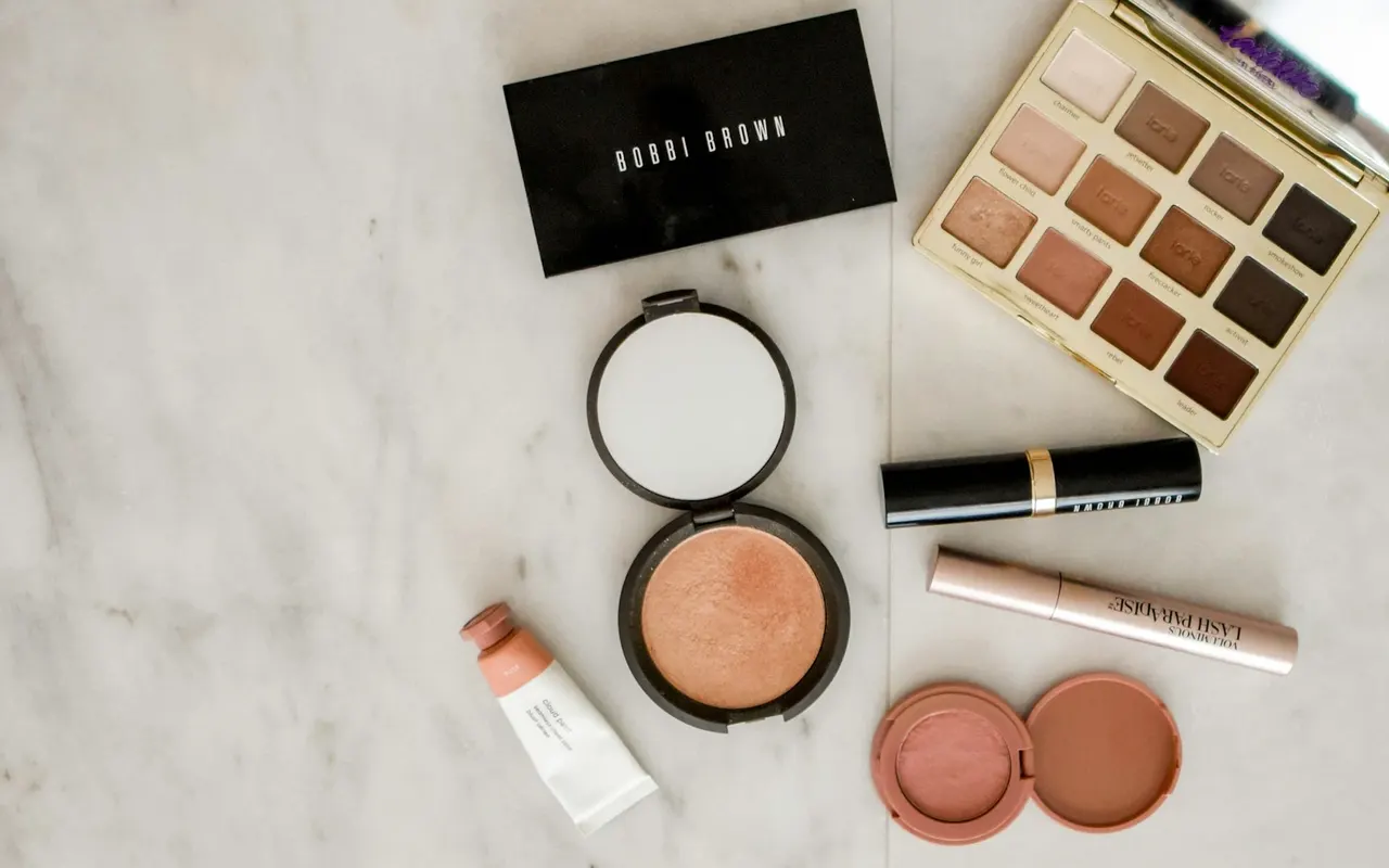 Makeup brushes and beauty products on a table