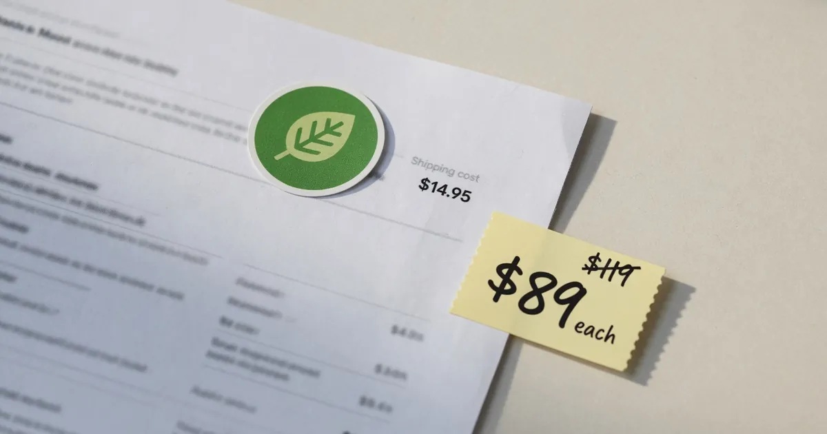 A climate-friendly badge beside a product page, a freight line, and a price that is not tied to the badge