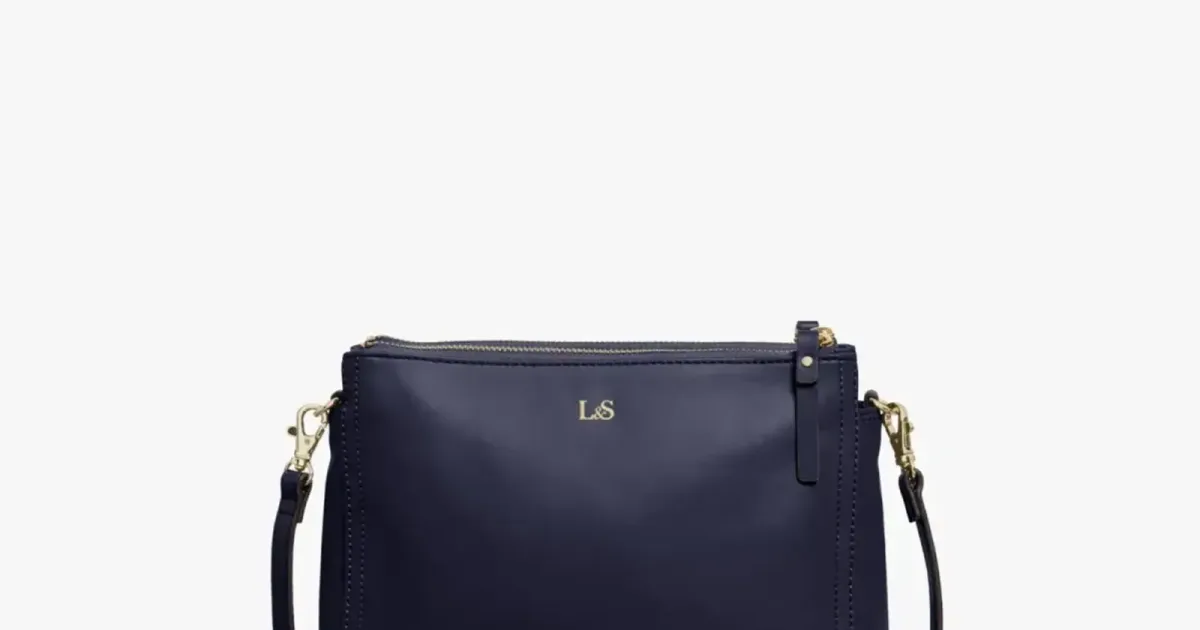 Navy leather crossbody — the parcel a cross-border label is written for