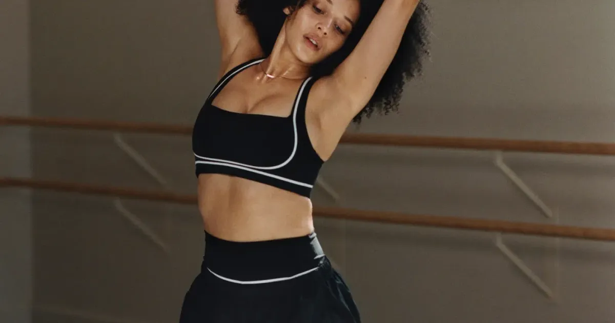 Black training set in a studio — official fitness apparel still