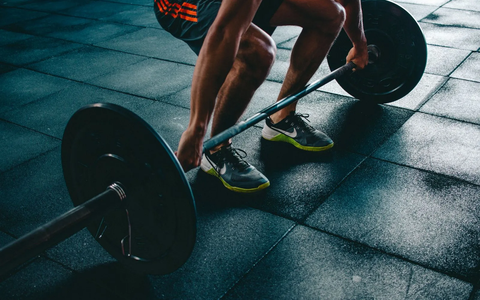 Barbell on a gym floor before a lift