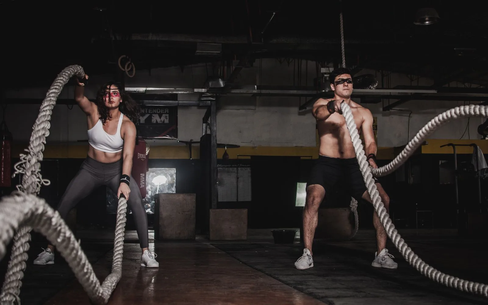 Barbell and plates on a gym floor